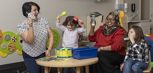 Soma Rivera and her daughters, Alexandra Sofia Heyen and Richell Sofía Heyen, pose for a photo with Jasmin Child Care and Preschool founder Rhoda Elmi