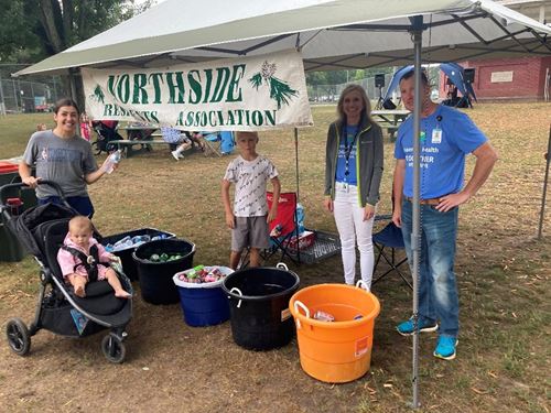Volunteers under tent at Northside Neighborhood Association