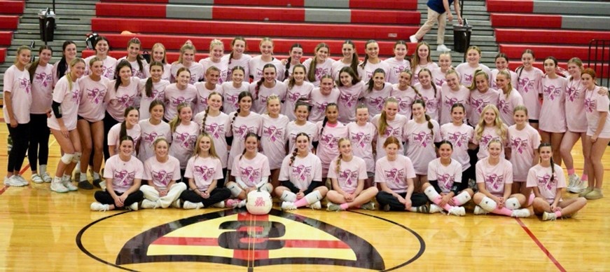 large group in pink t-shirts